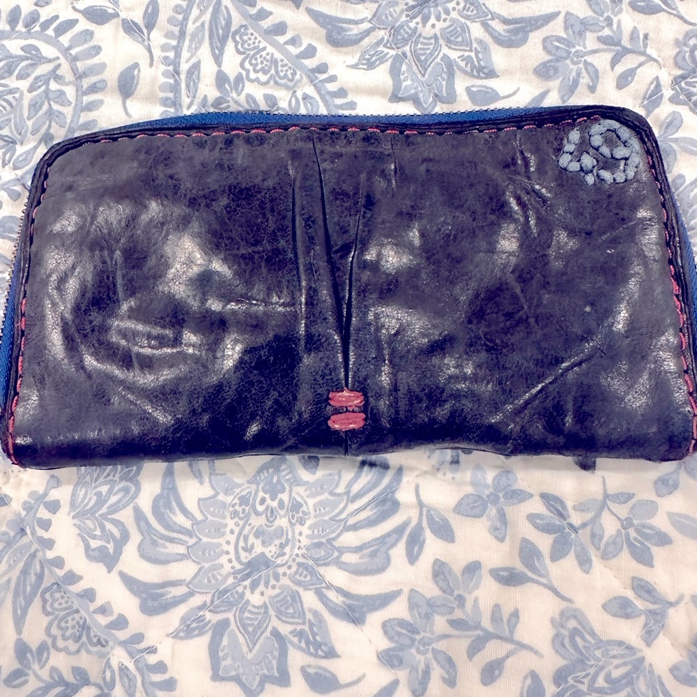 Blue leather zip around wallet with pink stitching